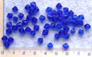 Skleněné korálky, mačkané,modré sluníčko, 6x5mm,cca53ks-10g
