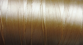šňůrka nylonová smetanová 0,8mm,5m