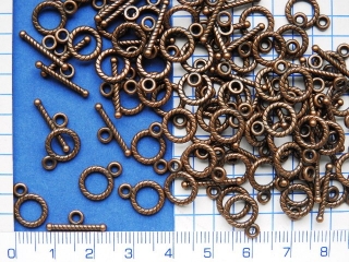 Zapínání americké měděné vroubkované kulaté,12mm,1pár