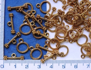 Zapínání americké, 13mm, kulaté vroubkované,zlaté, 1ks