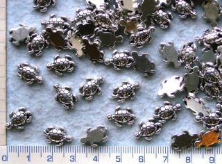 Kovové korálky, stř.želva, 13x9mm,1ks