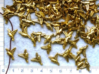 Kovové korálky,zlatý ptáček,15x10mm,1ks