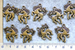 Kovové korálky,stř.koník,25x18mm,1ks