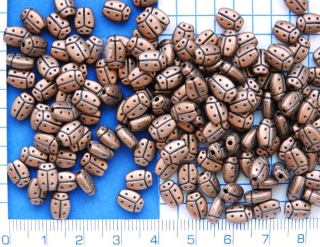 Kovové korálky,měděný korálek beruška,8x6mm,1ks