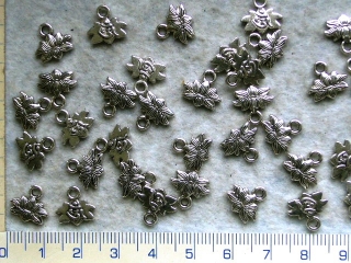 Kovové korálky, stř.lotus, 11x11mm,1ks