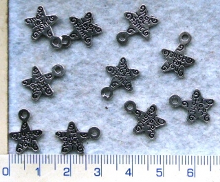Kovové korálky,stř.hvězda,15x12mm,1ks