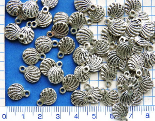 Kovové korálky,stř.mušle,13x9mm,1ks