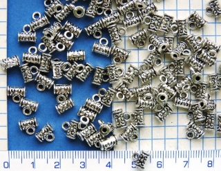 Kovové korálky,stř.korálek se závěsem,7x7mm,1ks
