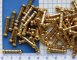 Kovový korálek,zlatý zdobený váleček,22x5mm,1ks