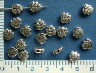 Kovový korálek, lupínek, 3x7mm, 1ks
