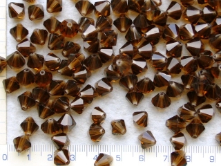 Broušené korálky, M.C.perle-sluníčka, 9mm,hnědé,10ks