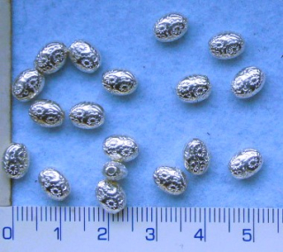 Kovové korálky, stř.oválek,6x7,5mm,1ks