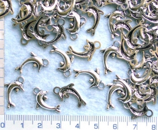 Kovové korálky, stříbrný delfín,17x9mm,1ks