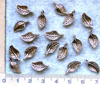 Kovové korálky, stříbrný lupen, 14x7mm,1ks