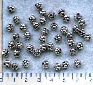 Kovové korálky, stř.rodnel,6x6mm, 1ks