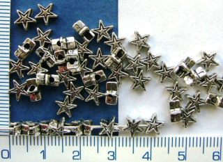 Kovový korálek, stř.hvězdička, 3x6mm, 1ks