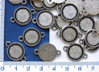 Lůžka na pryskyřici stř.lůžko 21x15mm, střed 12mm,2 očka,1ks